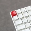 Edgy Danger backlit keycap showcasing its industrial warning sign design from multiple angles with vivid high-contrast lighting for mechanical keyboard.