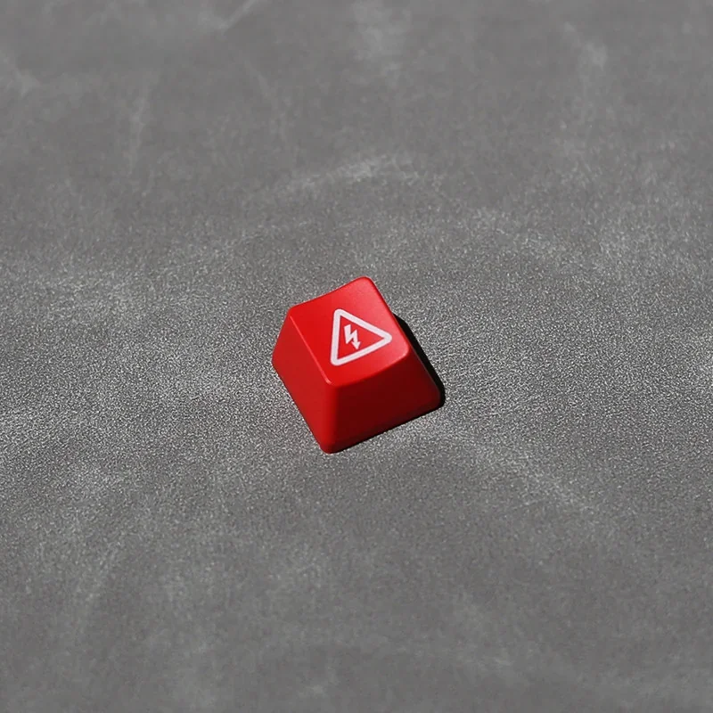 Dynamic angled view of the edgy Danger Backlit Keycap, showcasing its striking 'Electric Danger' industrial warning sign and vivid high-contrast backlight design.
