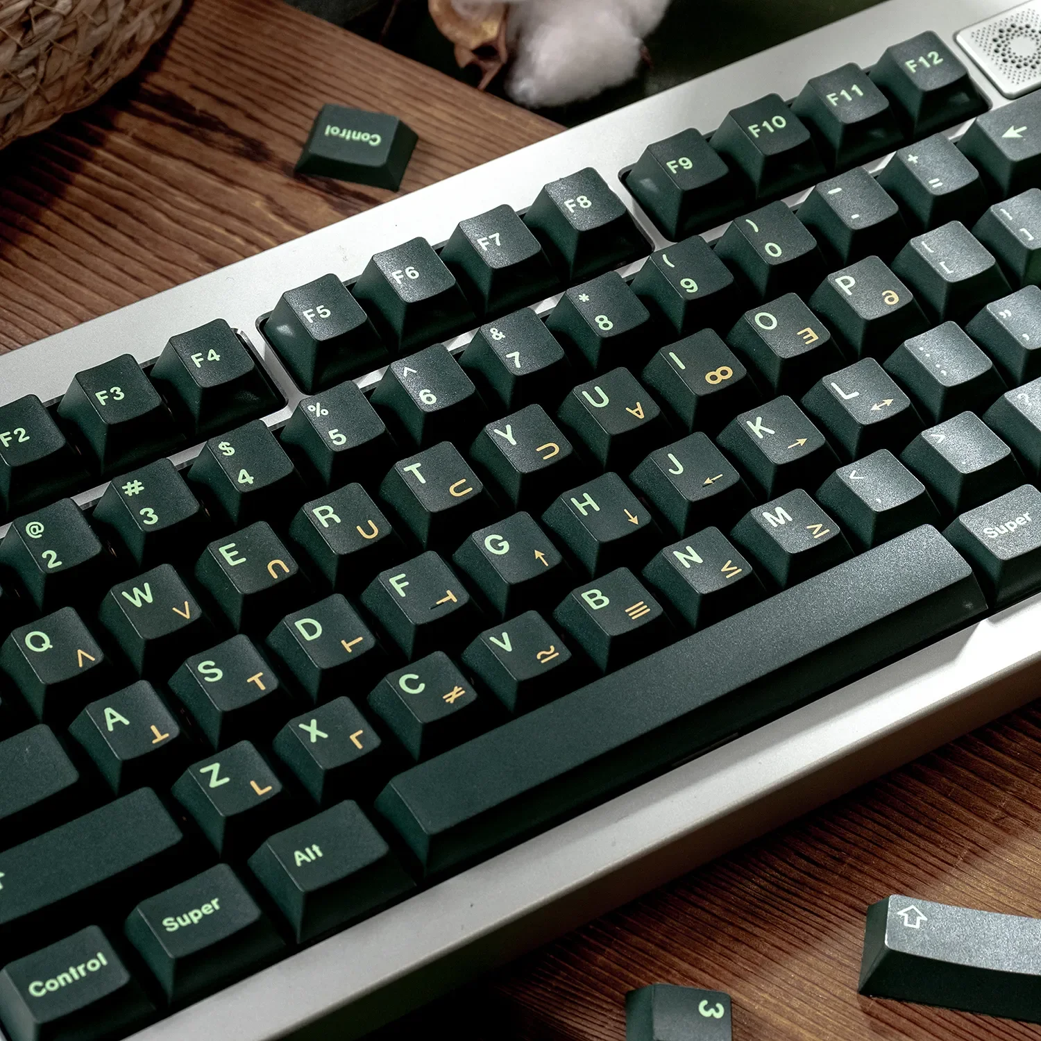 Durable dark green PBT keycap set, Cherry profile dye-sub set. Multi-angle view of premium forest green aesthetic for custom mechanical keyboards.