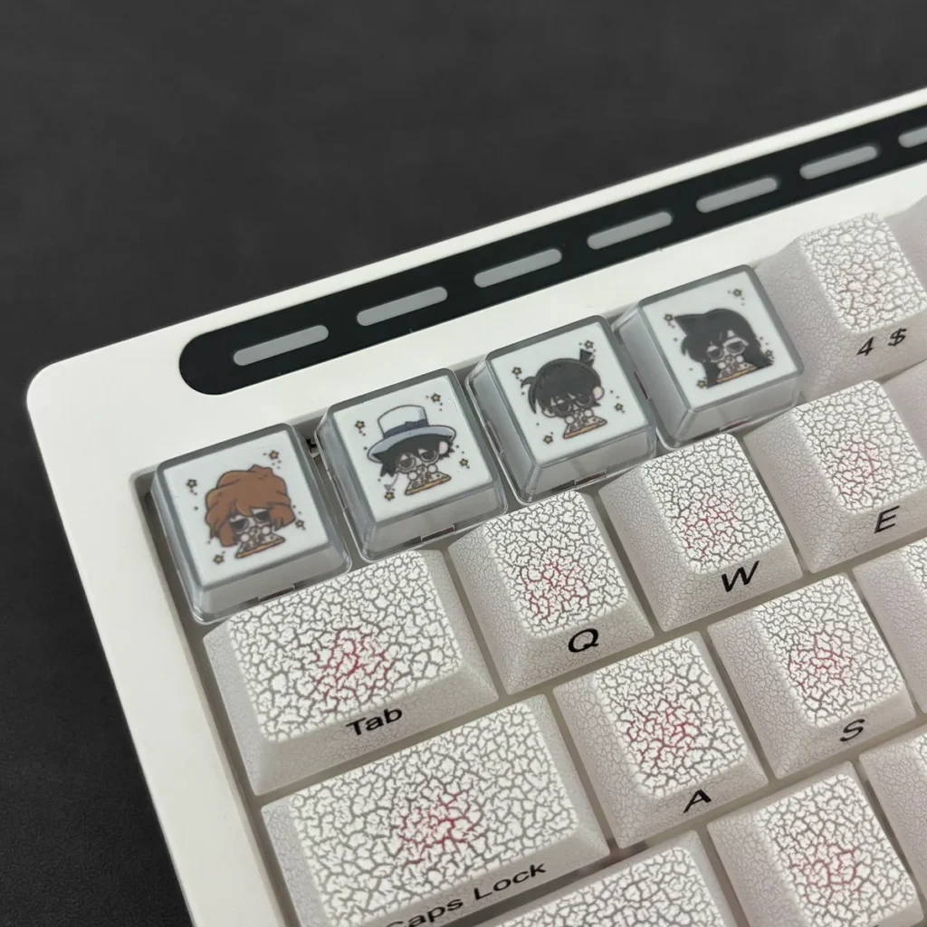 Vibrant Detective Conan backlit keycaps, a premium 4-piece set featuring intricate double-layer designs and glowing anime characters.