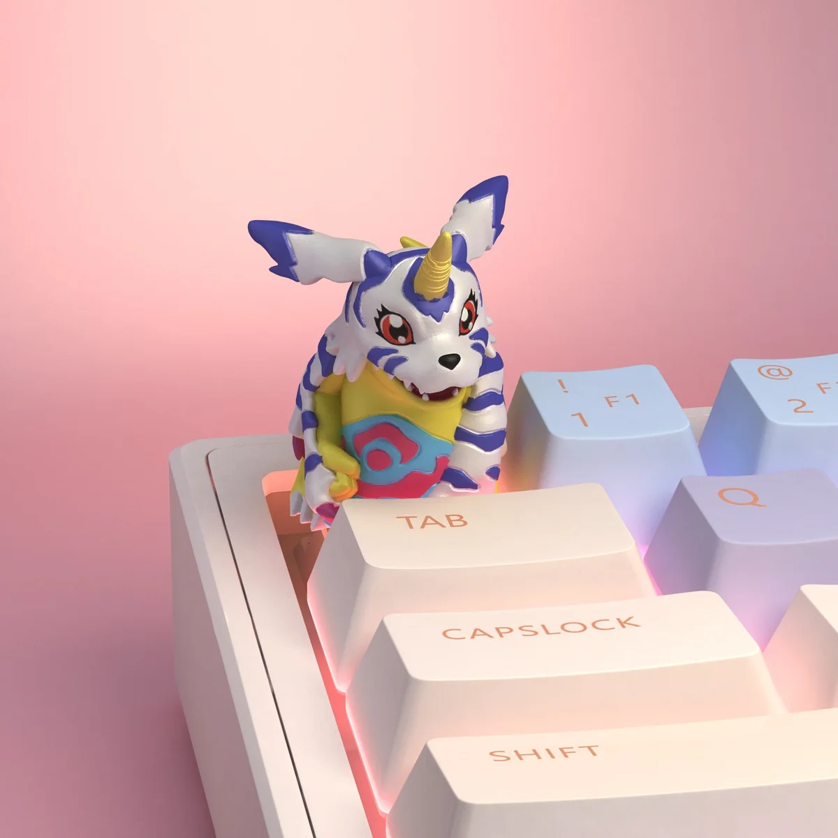 Vibrant, handcrafted resin Digimon keycaps showcasing detailed 3D sculpted characters from various playful angles for mechanical keyboards.