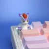 Vibrant handcrafted resin Digimon keycaps, showcasing detailed 3D sculpted characters from various angles, perfect for a playful keyboard upgrade.