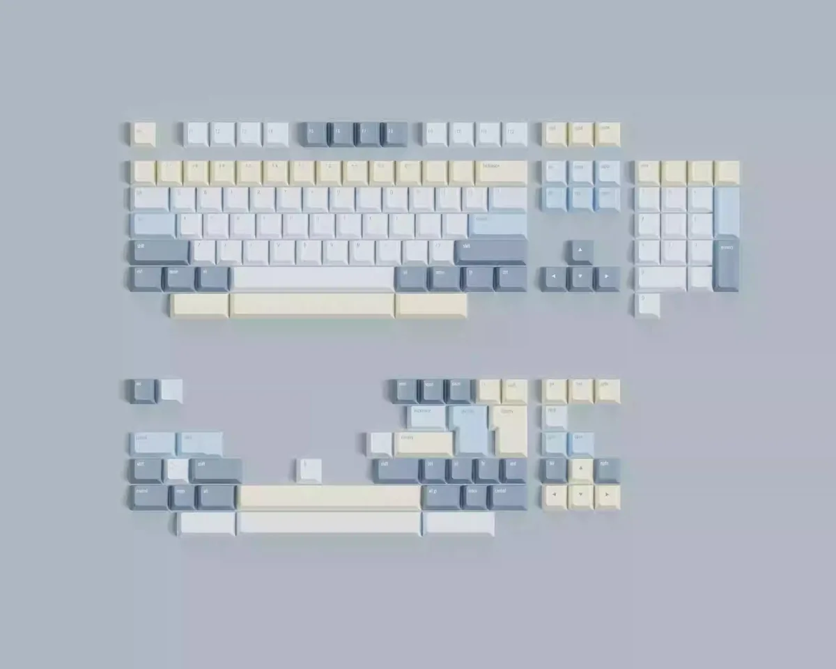 Eternity Moon on Sea magnetic keycaps set shown from various angles. Serene blue and luminous white evoke the ethereal ocean, highlighting magnetic compatibility.