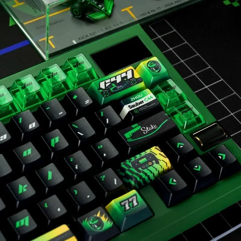 Exclusive F1 Keycap Set gallery for gaming keyboards, displaying dynamic Zhou Guanyu Sauber C44 livery and premium race car aesthetics.