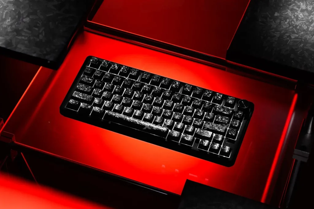 Premium Forged carbon keycaps set, featuring striking irregular texture and stealthy side-print legends, are fully magnetic switch compatible.