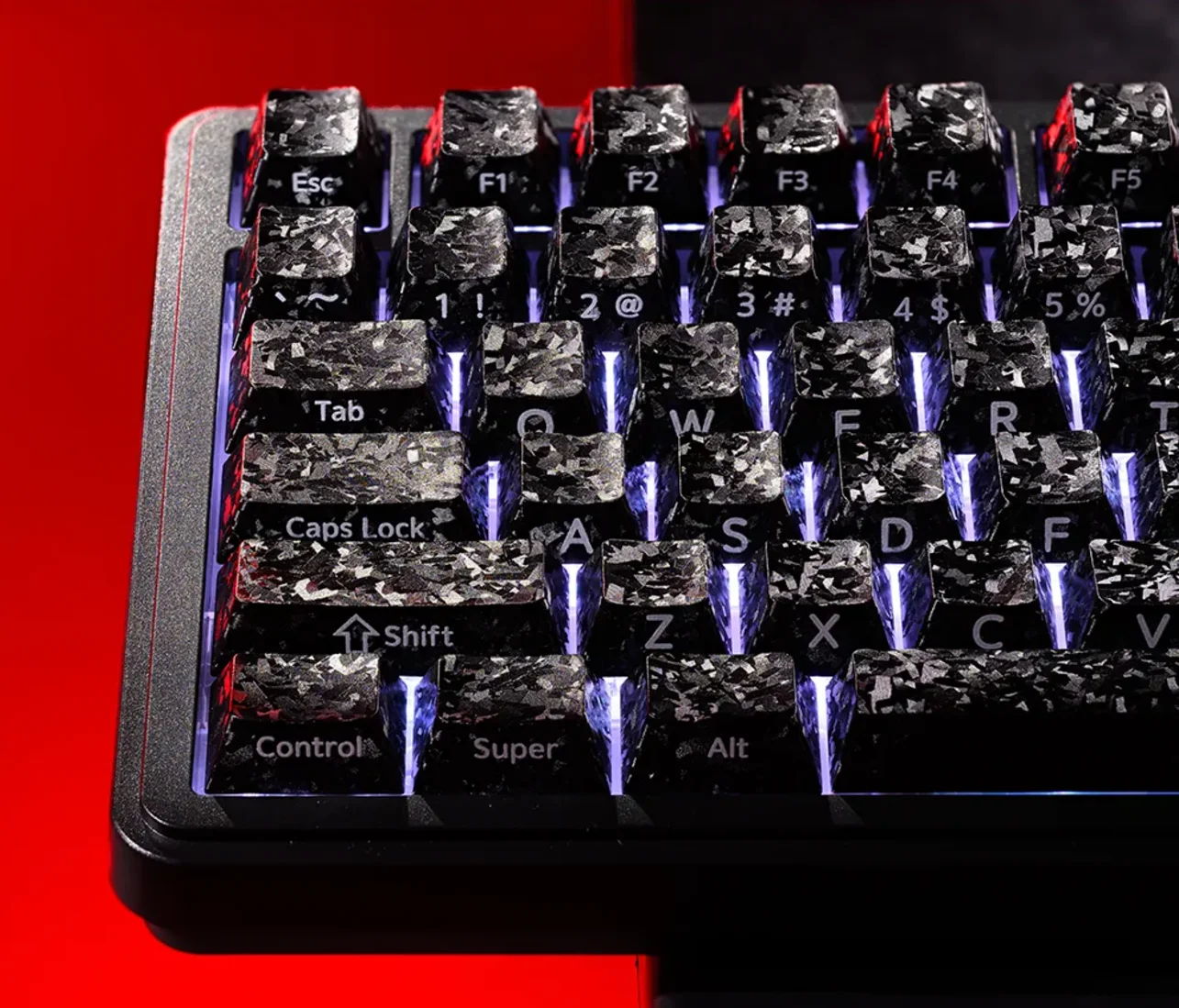 Forged Carbon Keycaps Set showcase striking irregular texture, sleek opaque finish, stealthy side-print legends, magnetic switch compatibility.