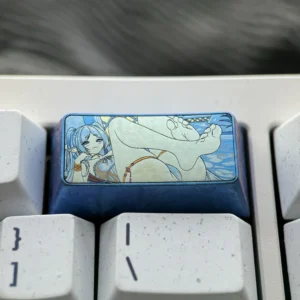 Handcrafted Frieren Keycap: a vibrant titanium 2U backspace keycap showcasing intricate Frieren anime art and exquisite elven details.