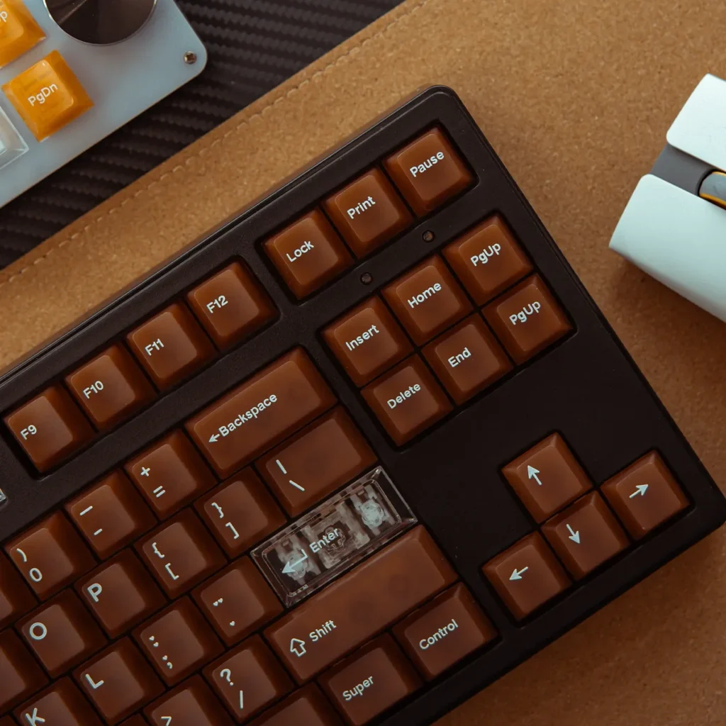 Artistic display of the 132-key Coffee PC Keycaps set, emphasizing the unique coffee translucent designs warm, diffused glow and elegant texture.