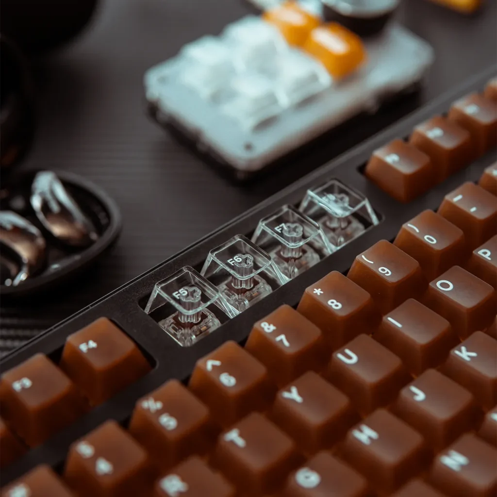Artistic Coffee PC Keycaps set, showcasing multiple angles of the unique coffee translucent design. The softly diffused polycarbonate evokes warm design.