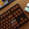 Multiple views of the artisanal Coffee PC Keycaps Set, revealing their unique coffee translucent design and softly diffused polycarbonate.