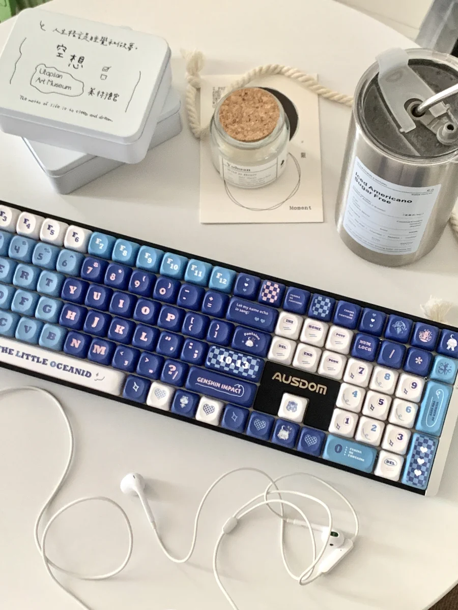 Elegant Furina PBT dye-sub keycap set for Genshin Impact, featuring vibrant blue, white, gold, and Fontaine motifs from various angles.