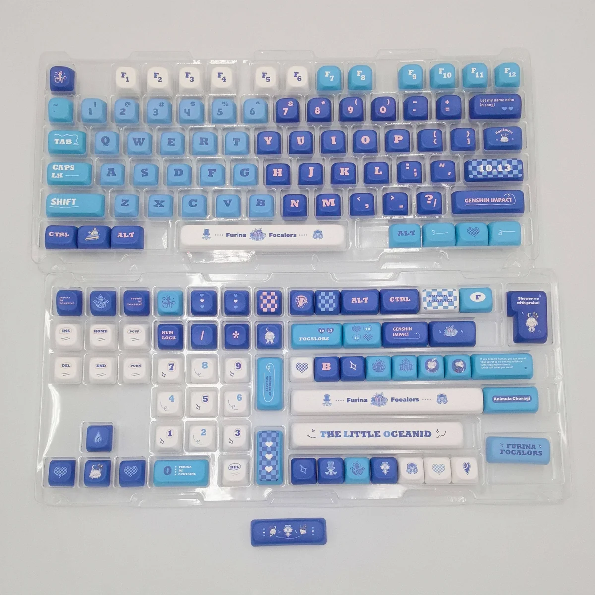 Elegant Furina PBT dye-sub keycap set for Genshin Impact, showcasing vibrant blue, white, and gold designs from multiple artistic angles.