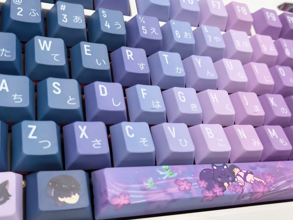 Exclusive Genshin Impact Wanderer PBT keycaps set from multiple angles, showcasing mystical blue-purple Scaramouche designs for an ethereal anime aesthetic.