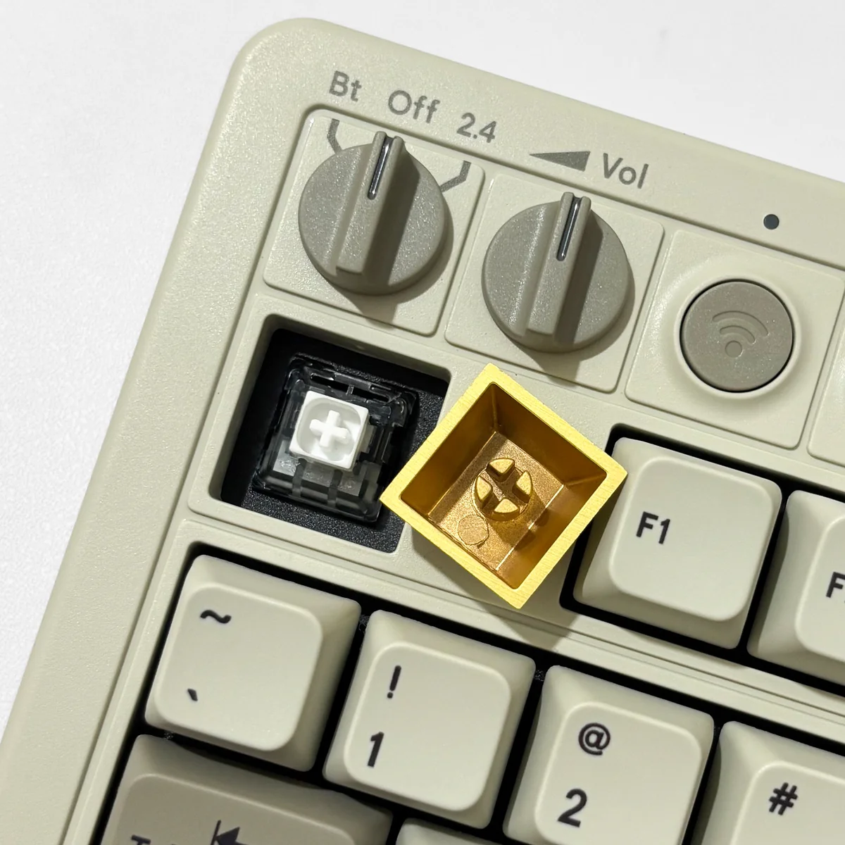 Premium Gold Keycaps, laser-engraved, electroplated gold finish. Views highlight its opulent design and weighty, luxurious feel.