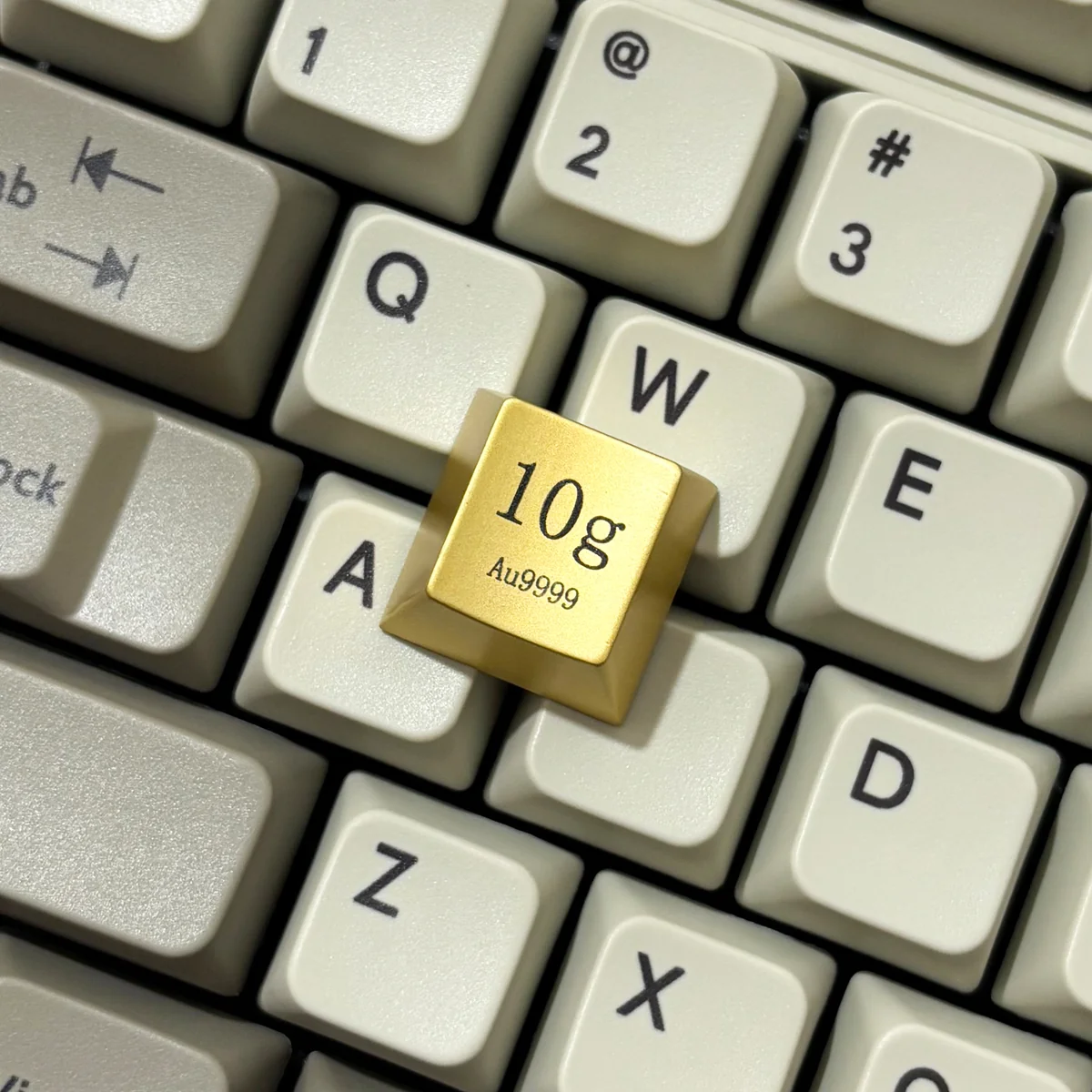 Premium Gold Keycaps, laser-engraved. Showcasing its opulent electroplated finish and weighty presence from multiple angles, a luxury accent.