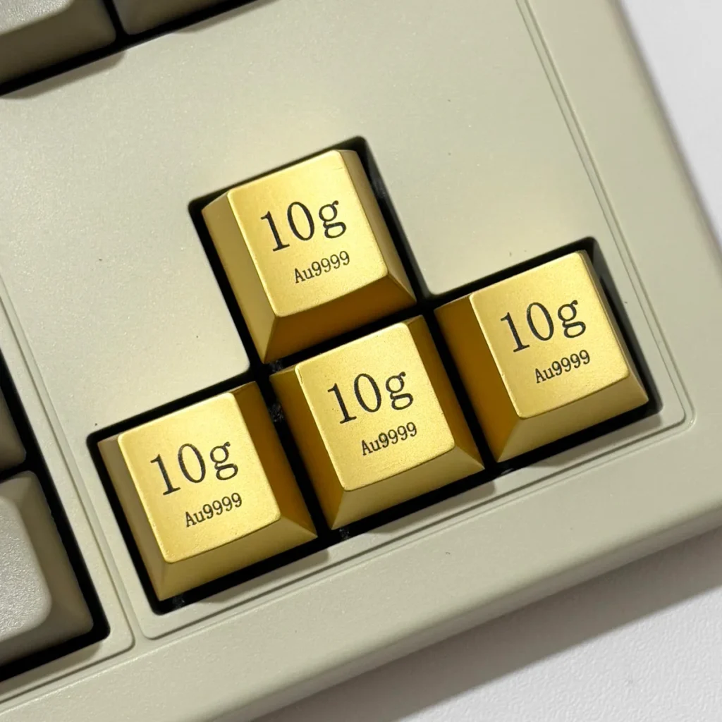Premium Gold Keycaps, showcasing its opulent electroplated finish and precision laser-engraved details for a luxurious desktop accent.