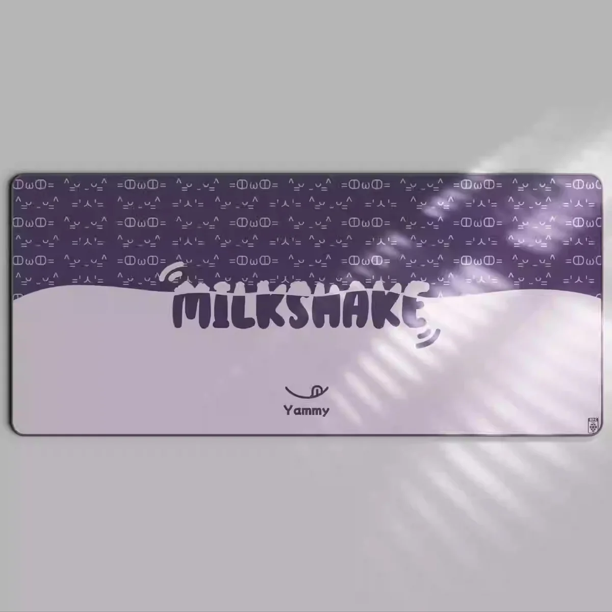 Grape Milkshake Desk Mat in various pastel purple and creamy white angles, highlighting its generous size and superior comfort for an inviting workspace.