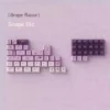 Whimsical Grape Milkshake PBT keycaps set with unique dye-sublimated sweet pastel purples and creamy whites for a playful, beverage-inspired keyboard aesthetics.