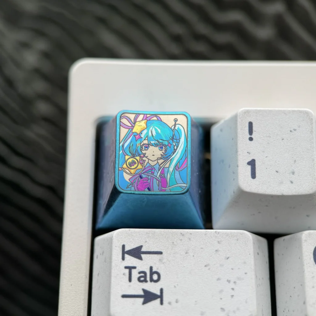 Vibrant Hatsune Miku Titanium Keycap, an exclusive premium anime ESC collectible featuring Mikus iconic character and futuristic metallic sheen.