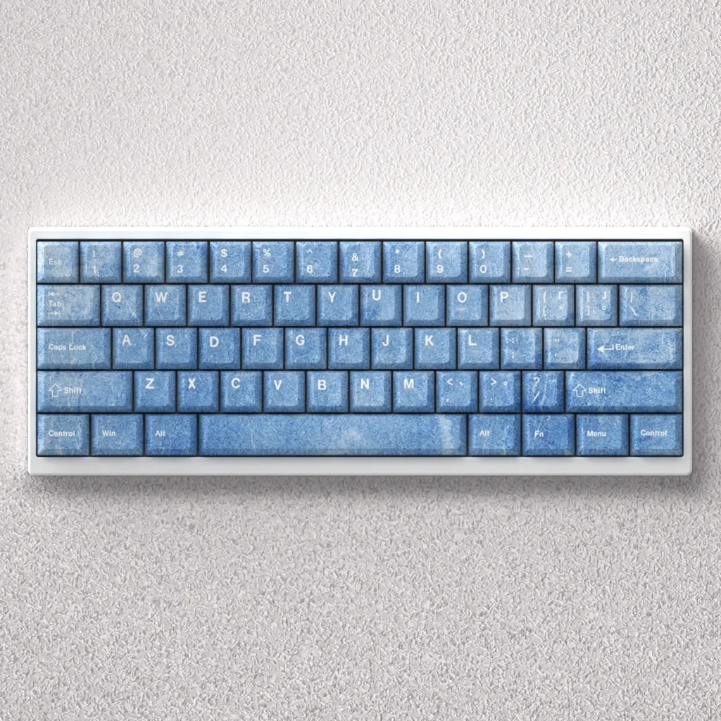 Premium Haze Blue PBT keycap set in Cherry profile, showcasing their serene, minimalist aesthetic and smooth texture on a modern keyboard setup.