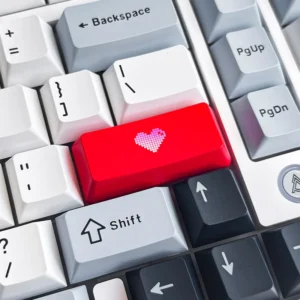 Gallery views of the premium Double-Shot ABS Backlit Heart Keycap, revealing its sleek black finish, glowing red heart, and ergonomic profile setup.