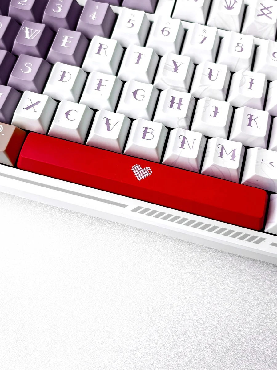 Playful Translucent Heart Space Key Keycap, a 6.25u double-shot ABS spacebar, shown from various angles highlighting its illuminated modern aesthetic.