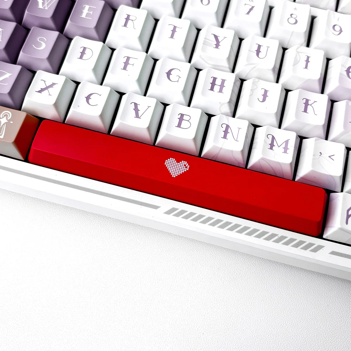 Playful red Translucent Heart Space Key Keycap, a double-shot ABS design with an illuminated heart motif, perfect for personalized keyboards.