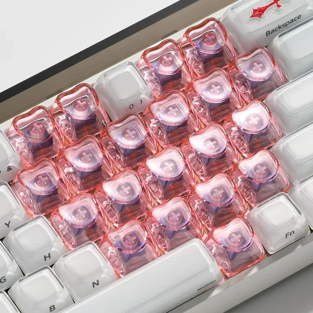 Premium transparent luminous heart keycaps set elegantly glowing on a magnetic keyboard, showcasing their sleek design and OEM profile.