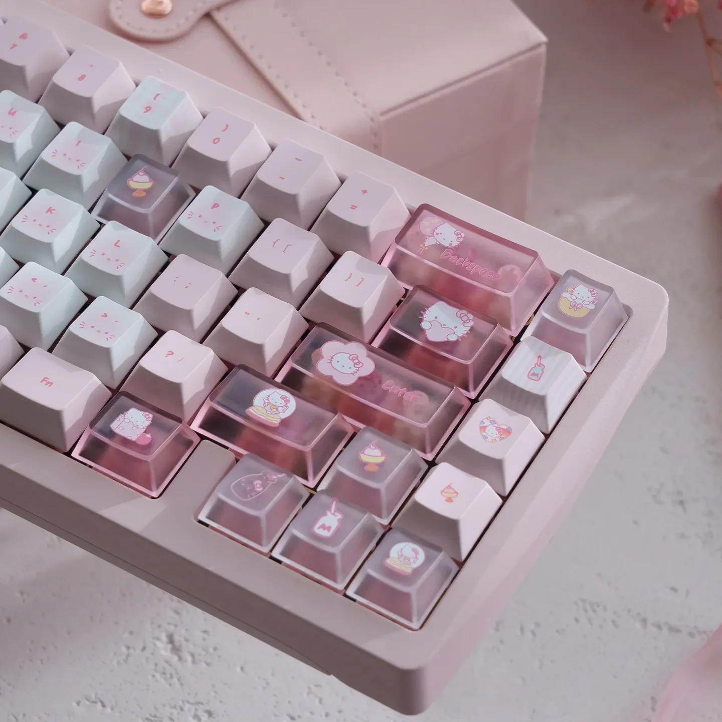 Full set of Hello Kitty PBT dye-sub keycaps set, showcased from various angles, highlighting durable construction and playful pink designs.