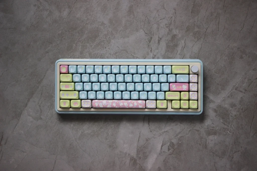 Adorable Hello Kitty MOA profile keycaps set in a playful gallery, featuring various pastel characters from different angles for a cute mechanical keyboard.
