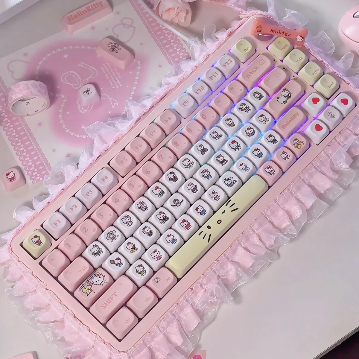 Joyful Hello Kitty dye-sub PBT keycaps set, viewed from a delightful angle, highlighting the iconic pastel pink and white characters and crisp legends.