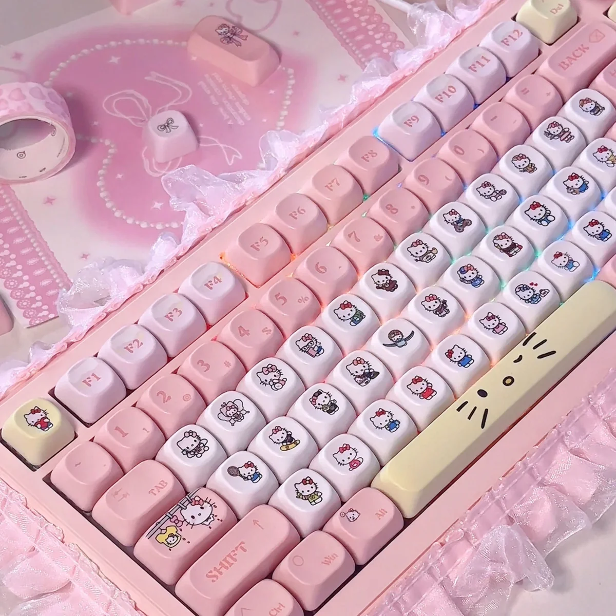 Detailed view of Hello Kitty Joyful Pink opaque Dye-Sub PBT MOA profile keycaps set, showcasing the playful rounded pastel design for a small full set.