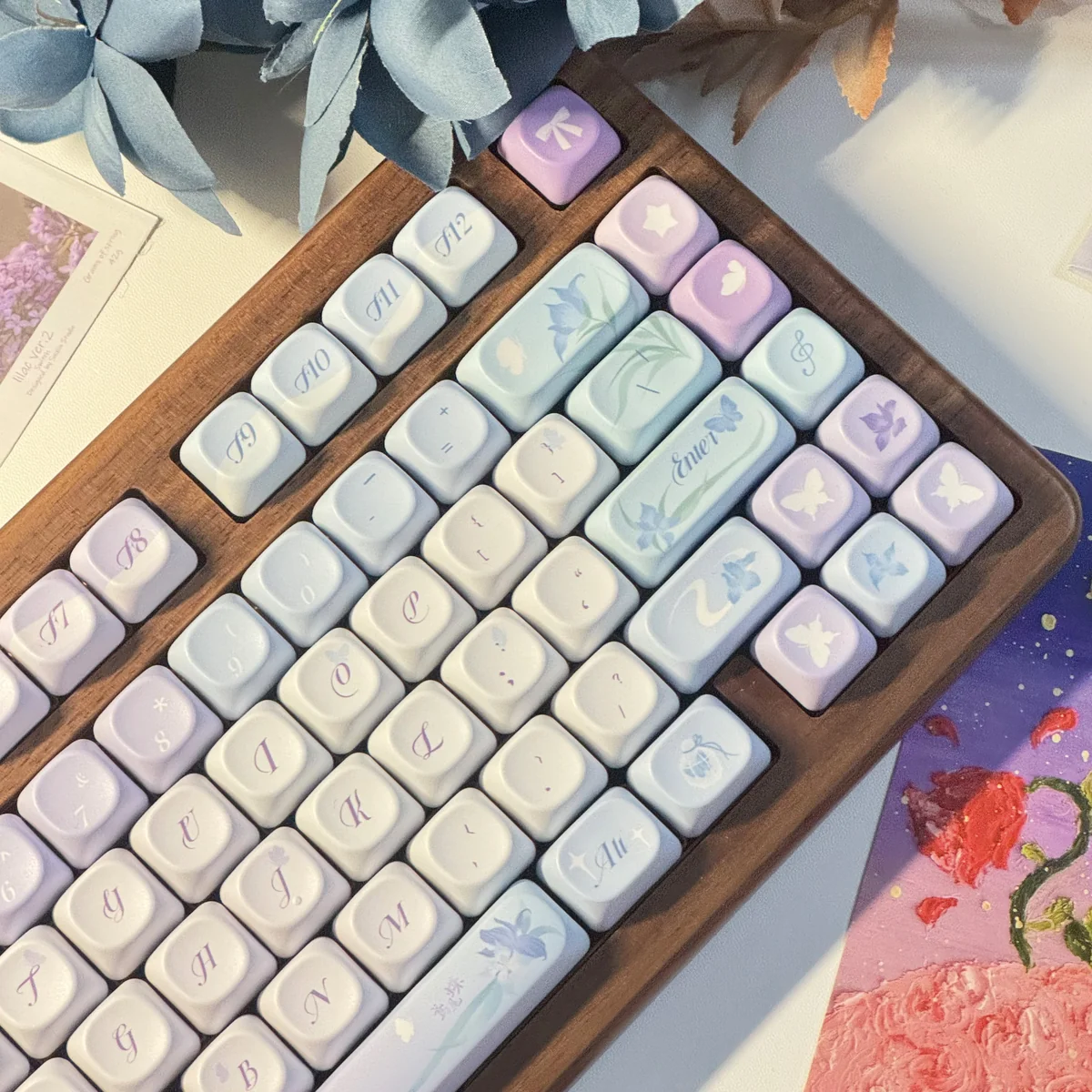 Close-up of the Dreamy Iris Butterfly PBT Backlit Keycap Set, showcasing ethereal purple irises and delicate butterfly designs on the keycaps.