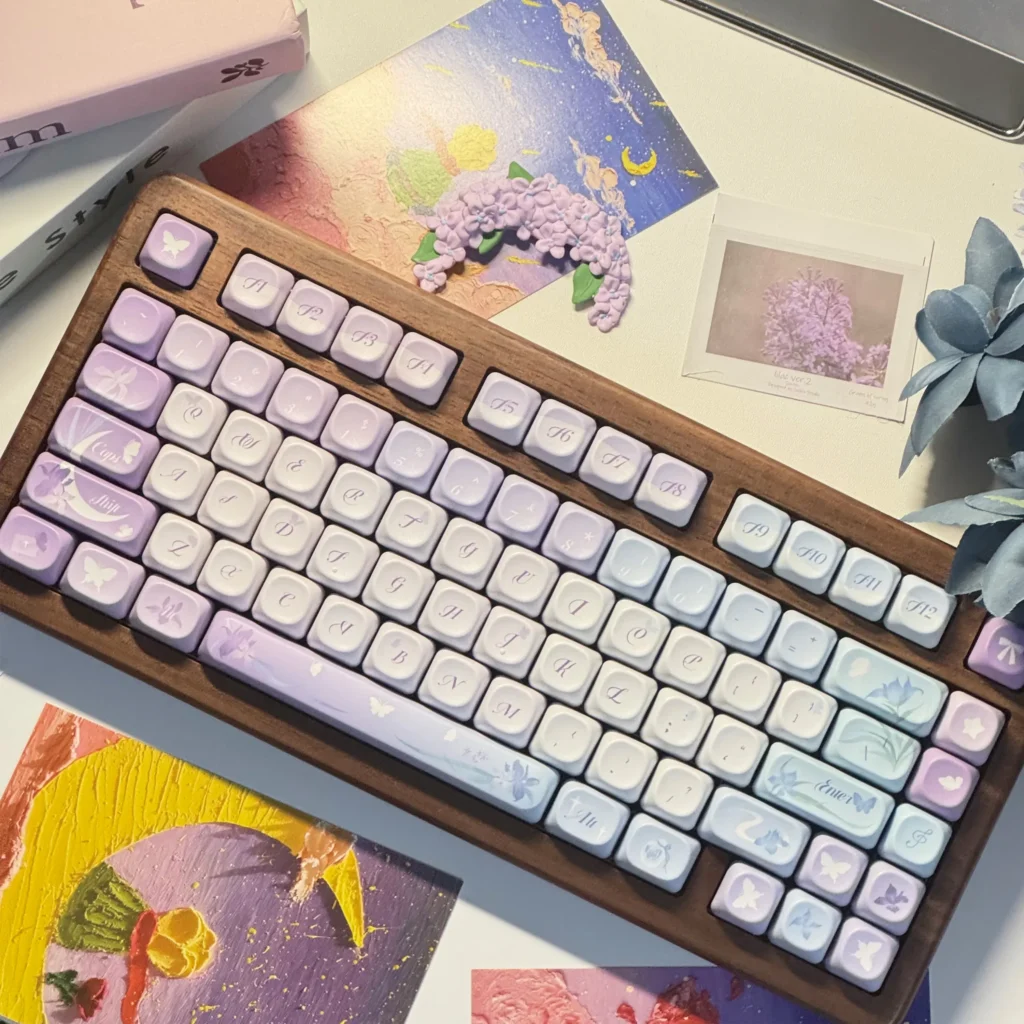 Exquisite Iris Keycaps Set featuring whimsical butterfly and iris motifs in elegant purple, showcasing a serene Chinese aesthetic for a dreamlike design.