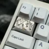 Precision engraved Premium Ishtar & Ereshkigal Tab Key Keycap, revealing intricate anime motifs, fine pointillist texture, and its luxurious polished metallic design.