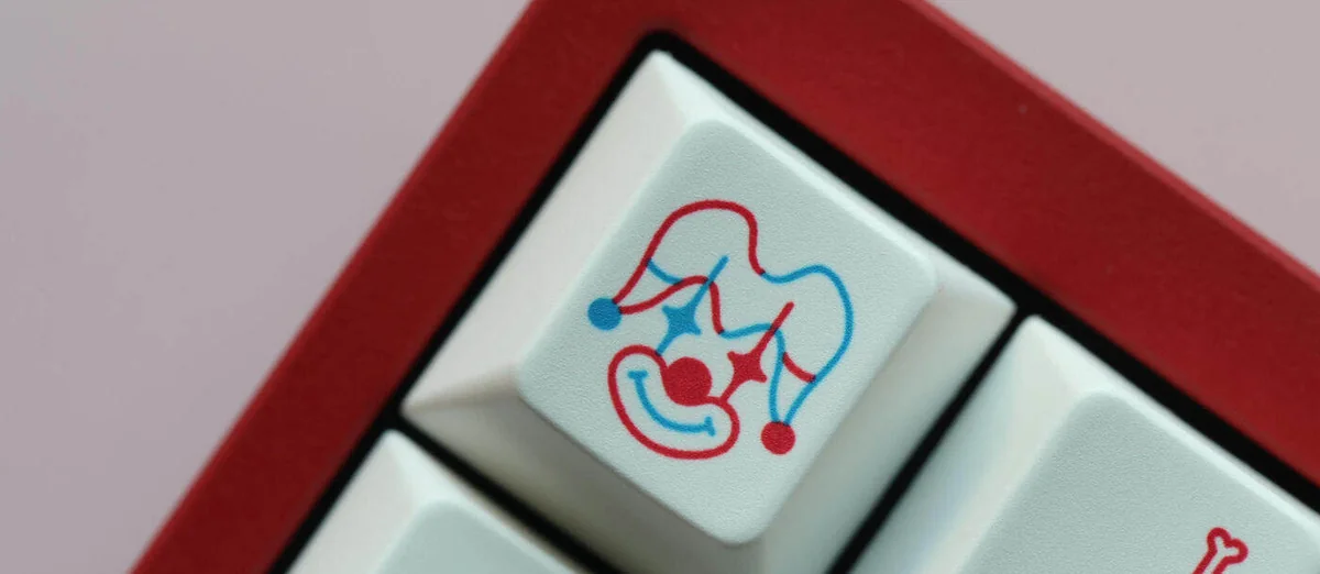 Joyride PBT keycaps set: vibrant, playful retro journey. Durable PBT and adventurous legends showcased from various angles.