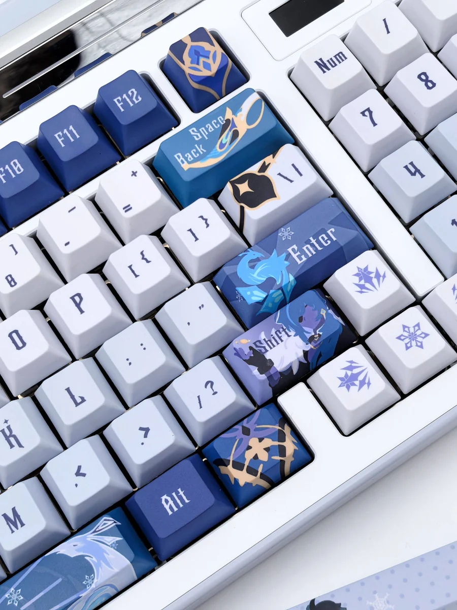 Exclusive Kaeya Genshin Impact artisan keycap set displayed from multiple angles, featuring exquisite icy blue, noble gold, and dark accents.