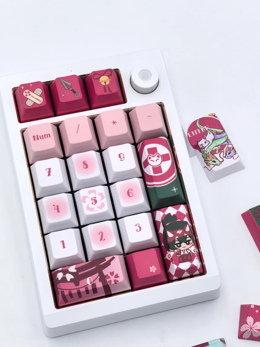 Vibrant red and white Kiriko Overwatch PBT keycaps set, showcasing multiple angles of the durable Cherry profile keys with Kitsune spirit and ninja aesthetics.