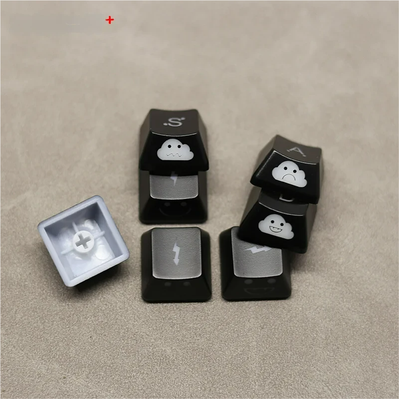 Lightning Cloud Movement Control Keycaps. See the unique playful character design and translucent ABS material, perfect for glowing RGB design.