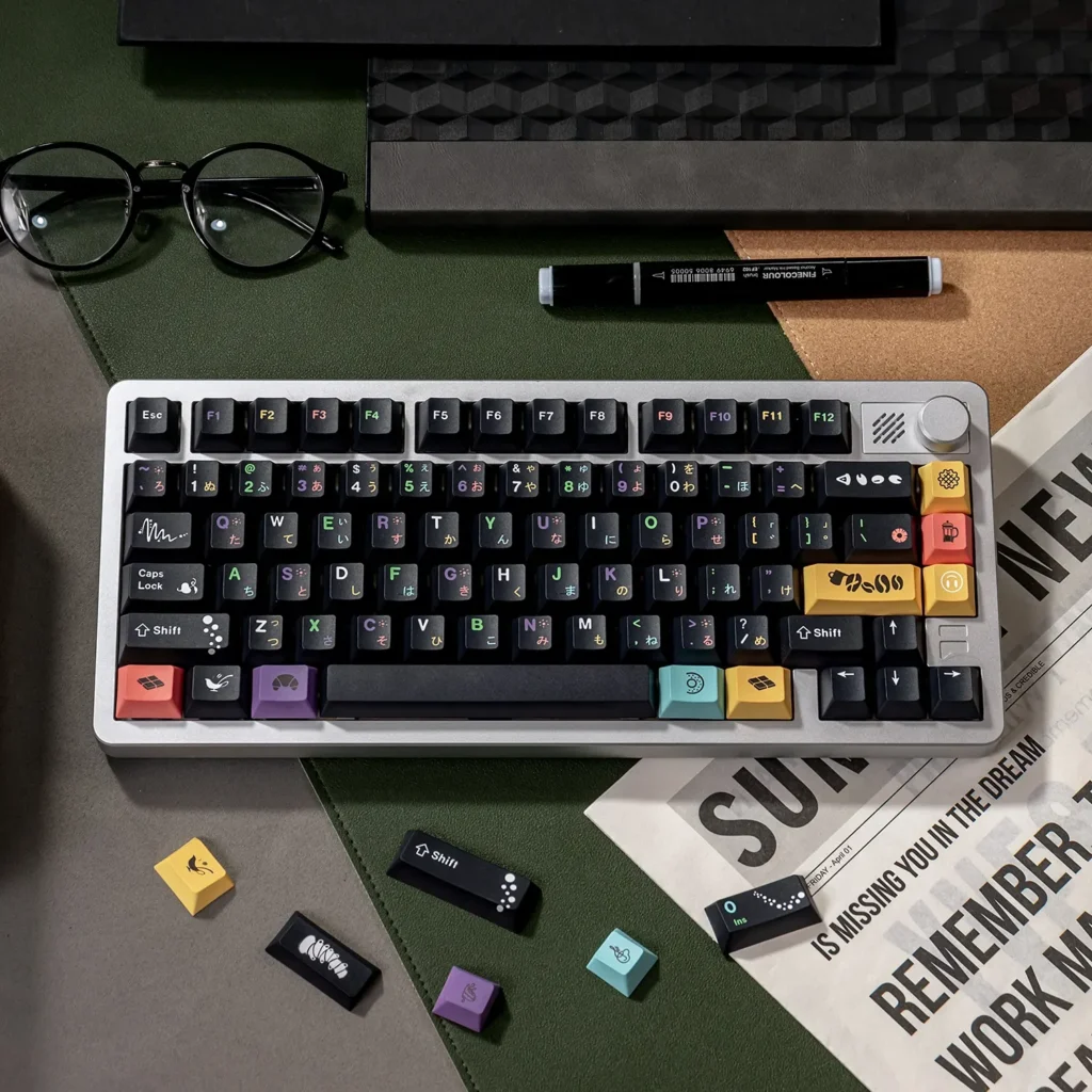 Sophisticated black PBT dye-sublimated magnetic switch keycaps set, custom fit, elegantly displayed with classic tea-inspired icons for a premium setup.