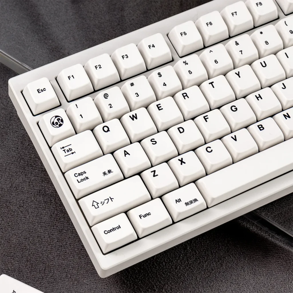 Various views of premium minimalist white magnetic switch keycaps set with serene MDA profile, designed for peak performance and crisp aesthetic.