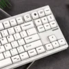 Gallery view of pristine minimalist white Magnetic Switch Keycaps Set, highlighting the serene MDA profile from multiple angles for a premium setup.