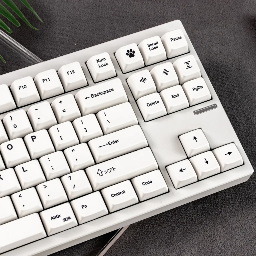 Gallery view of pristine minimalist white Magnetic Switch Keycaps Set, highlighting the serene MDA profile from multiple angles for a premium setup.