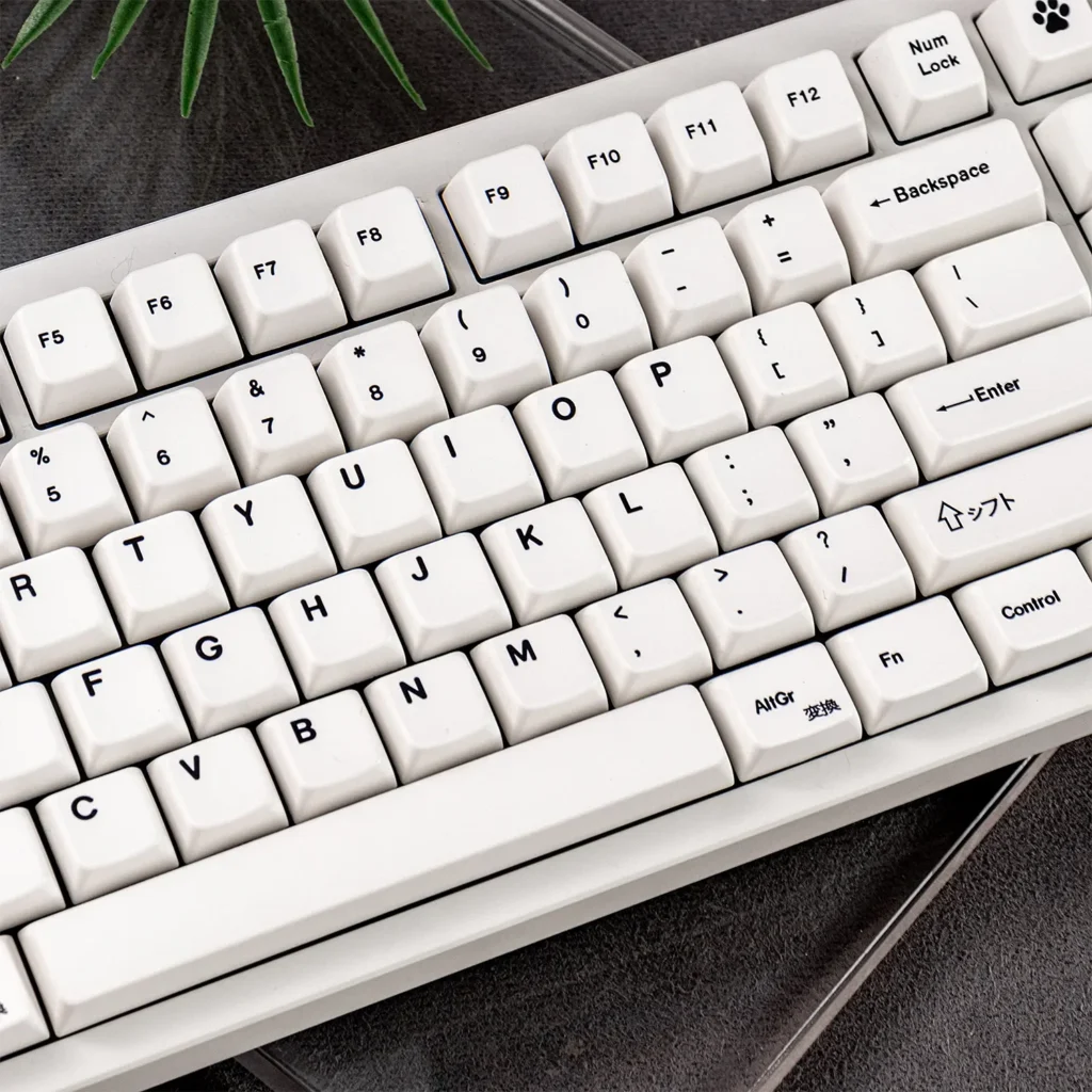 Explore various angles of the Refreshing Minimalist White Magnetic Switch Keycaps Set, highlighting their serene MDA Profile and crisp design.