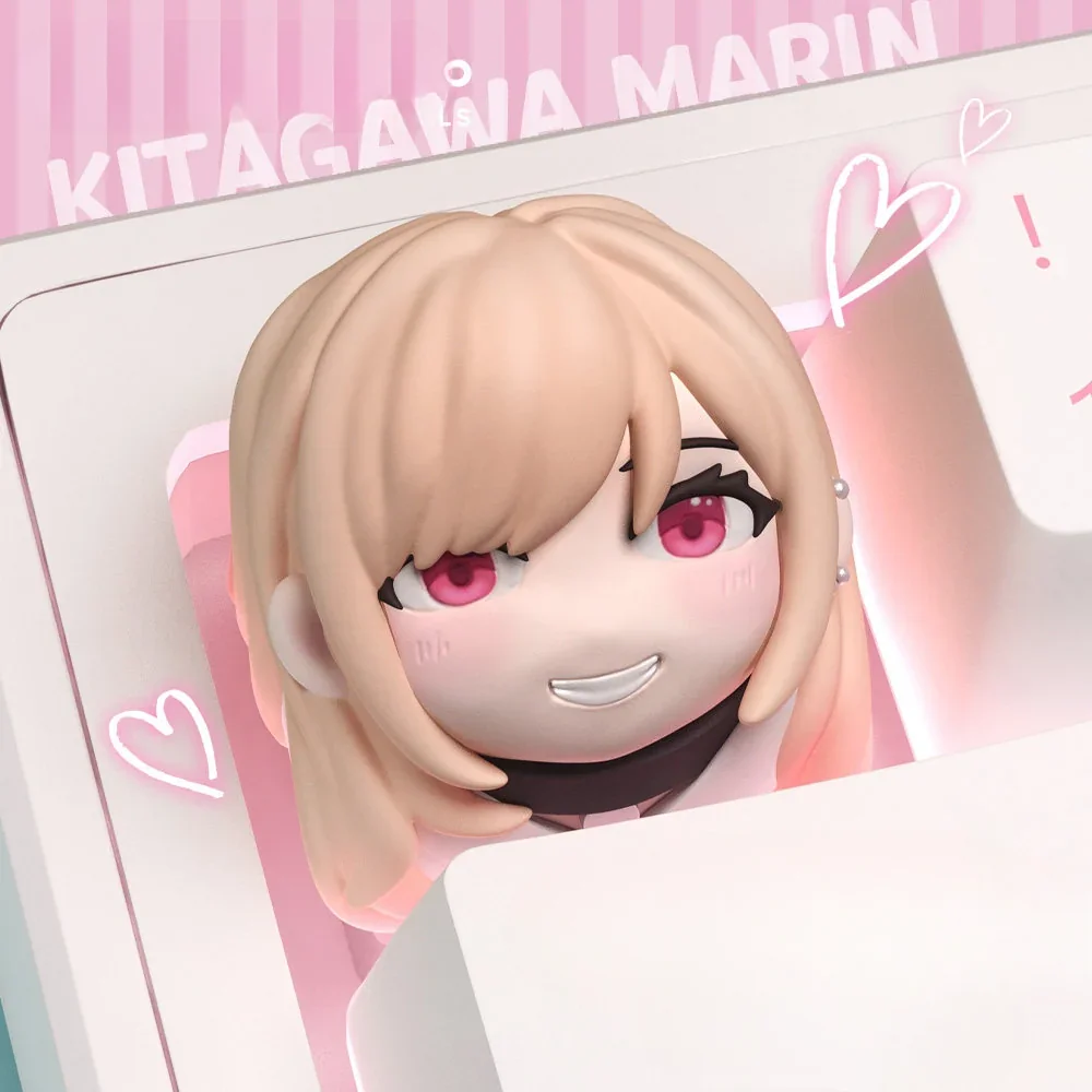 Close-up of exclusive Marin Kitagawa anime keycap, showcasing vibrant character art from multiple playful angles on a mechanical keyboard.