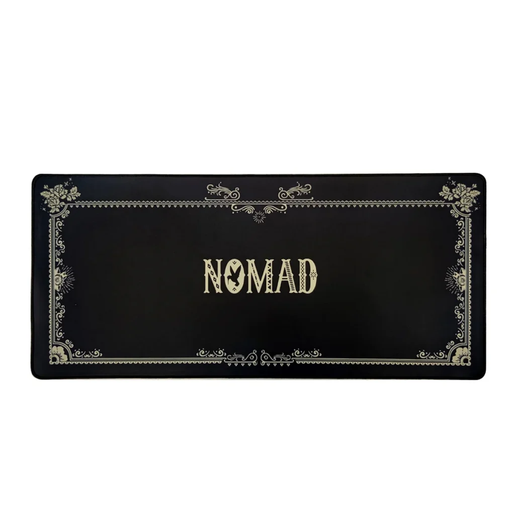 Showcasing the iconic Megalobox Nomad desk mat with its gritty, retro-futuristic anime art and distressed aesthetic. Experience this premium, waterproof design.