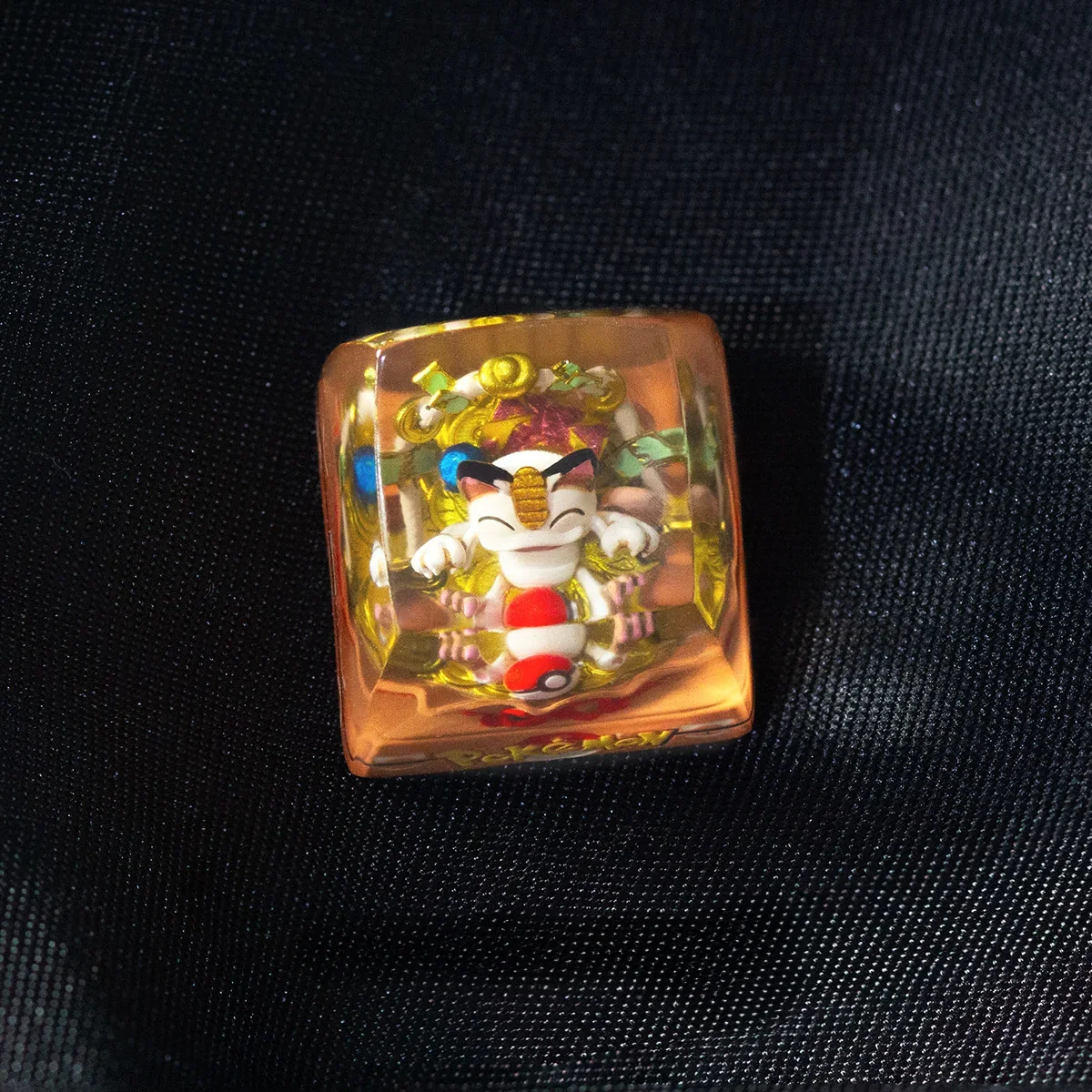 Playful handcrafted luminous Pokemon: Meowth & Snorlax Transparent Keycaps from a different angle, showcasing its vibrant, glossy translucent resin and cute design.