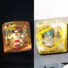 Playful handcrafted luminous Pokemon: Meowth & Snorlax Transparent Keycaps crafted from vibrant, glossy translucent resin, showcasing its cute design.