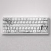 Exquisite black and white PBT keycaps set featuring Kaori Miyazono from the anime Your Lie in April in a captivating line art style.