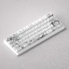 Elegant black and white PBT keycaps set depicting Miyazono Kaori in a unique line art style, enhancing 60, 65, and 68 keyboard aesthetics.